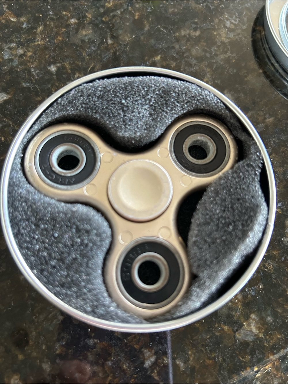 Bronze-colored Fidget Spinner with Carry Tin - Simple Stress Relief Toy